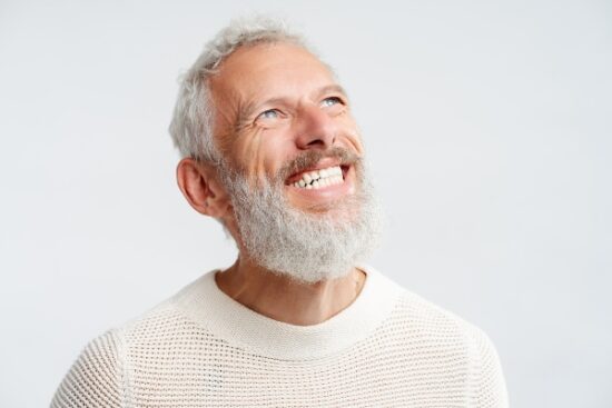middle-aged man with beard smiling