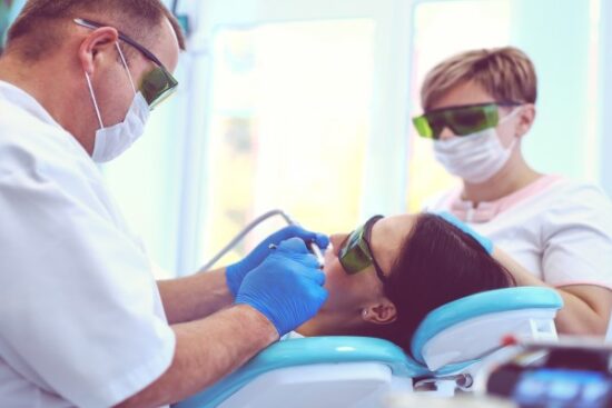 patient undergoing deep teeth cleaning