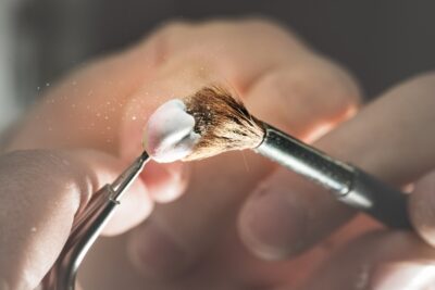 up-close view of a brush cleaning a dental crown
