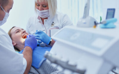 female patient undergoing dental implant care