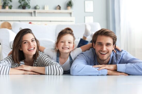 mother and father with their daughter