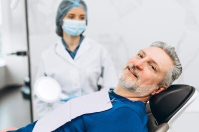 older man preparing for gum disease treatment