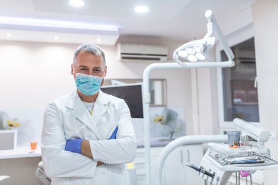 male dentist wearing a mask