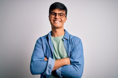 person wearing glasses and smiling