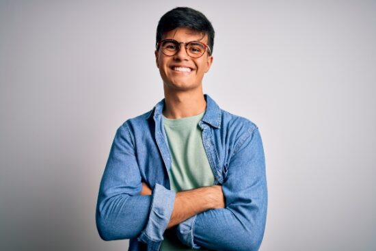 person wearing glasses and smiling