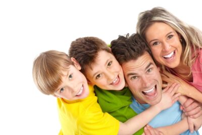 happy family of four smiling